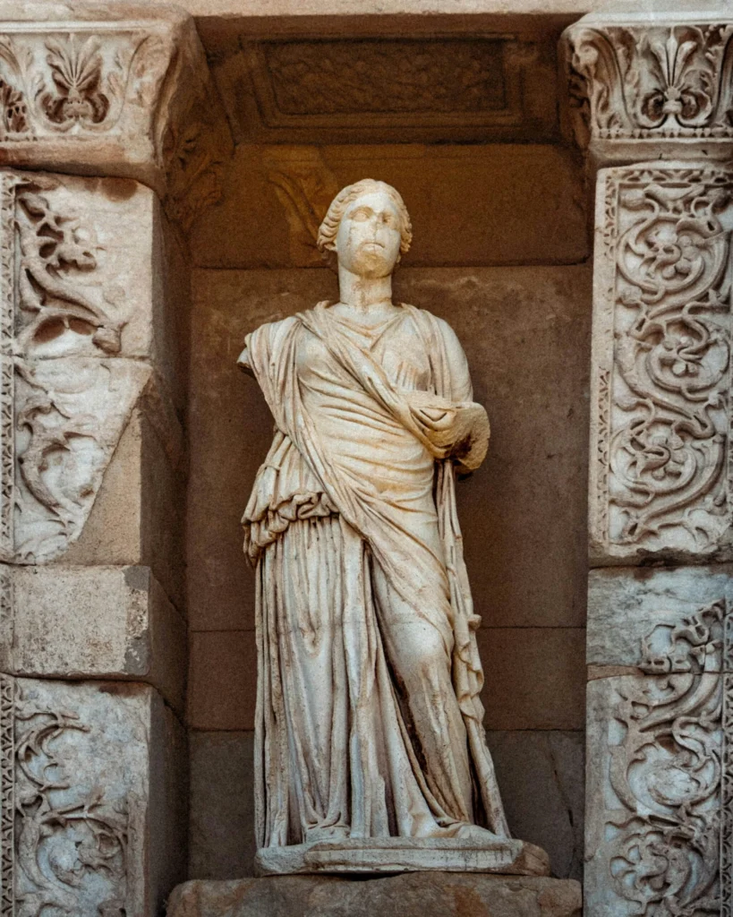 a statue of a woman in a white dress